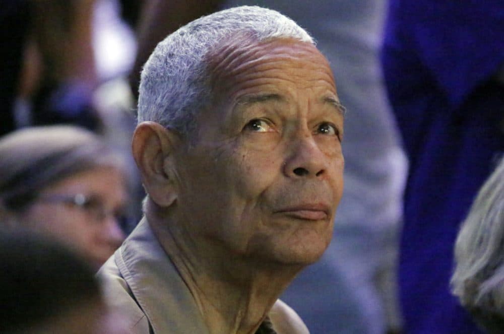 Julian Bond, one of the founders of the Student Nonviolent Coordinating Committee and an American social activist, watches a presentation on overhead video screens at the 50th Anniversary Freedom Summer conference at Tougaloo College in Jackson, Miss., Thursday, June 26, 2014.  (AP Photo/Rogelio V. Solis)