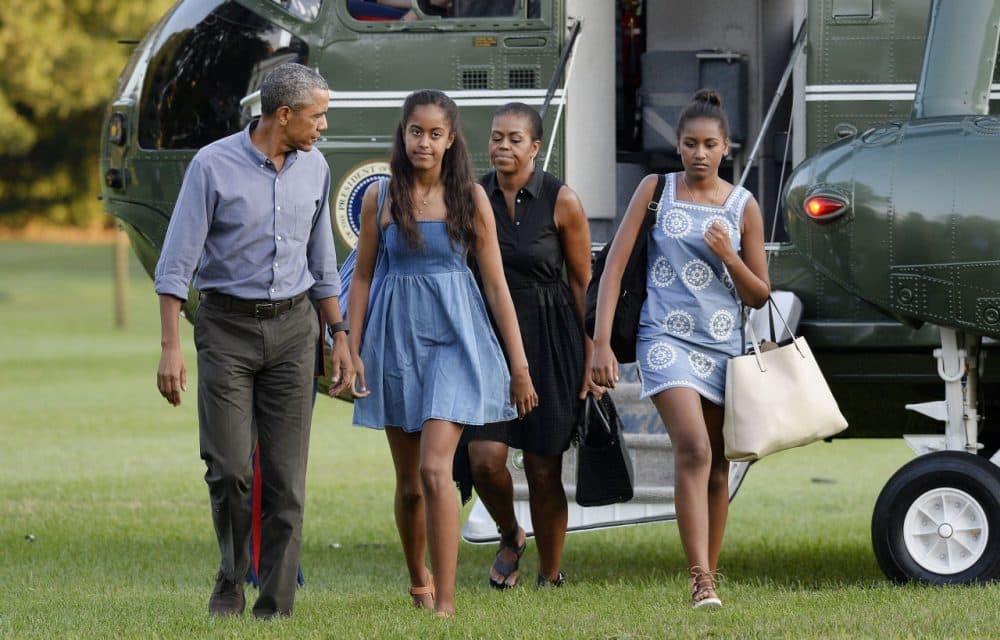 U.S. President Barack Obama, daughters Sasha and Malia and First Lady Michelle Obama arrive at the White House August 23, 2015 in Washington, D.C. The first family was returning from vacationing on Martha's Vineyard. (Olivier Douliery/Getty Images)