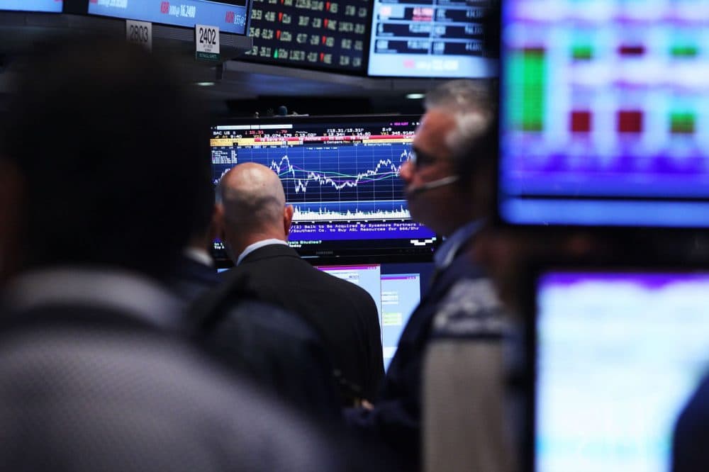 Traders work on the floor of the New York Stock Exchange (NYSE) on August 24, 2015 in New York City. As the global economy continues to react from events in China, markets dropped significantly around the world on Monday. The Dow Jones industrial average briefly dropped over 1000 points in morning trading. (Spencer Platt/Getty Images)
