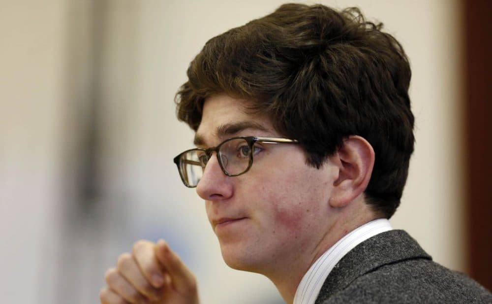 Owen Labrie listens to testimony in Merrimack County Superior Court Tuesday. He is charged with raping a 15-year-old freshman as part of the &quot;Senior Salute&quot; at the prestigious St. Paul's School in Concord. (Jim Cole/AP)