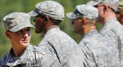 Women have historically reached military milestones as soon as barriers against them were lifted. They were ready. It was the men who were not. But the tide may be turning. In this photo, U.S. Army Capt. Kristen Griest, left, of Orange, Conn., stands in formation during an Army Ranger School graduation ceremony, Friday, Aug. 21, 2015, at Fort Benning, Ga. (John Bazemore/AP)

