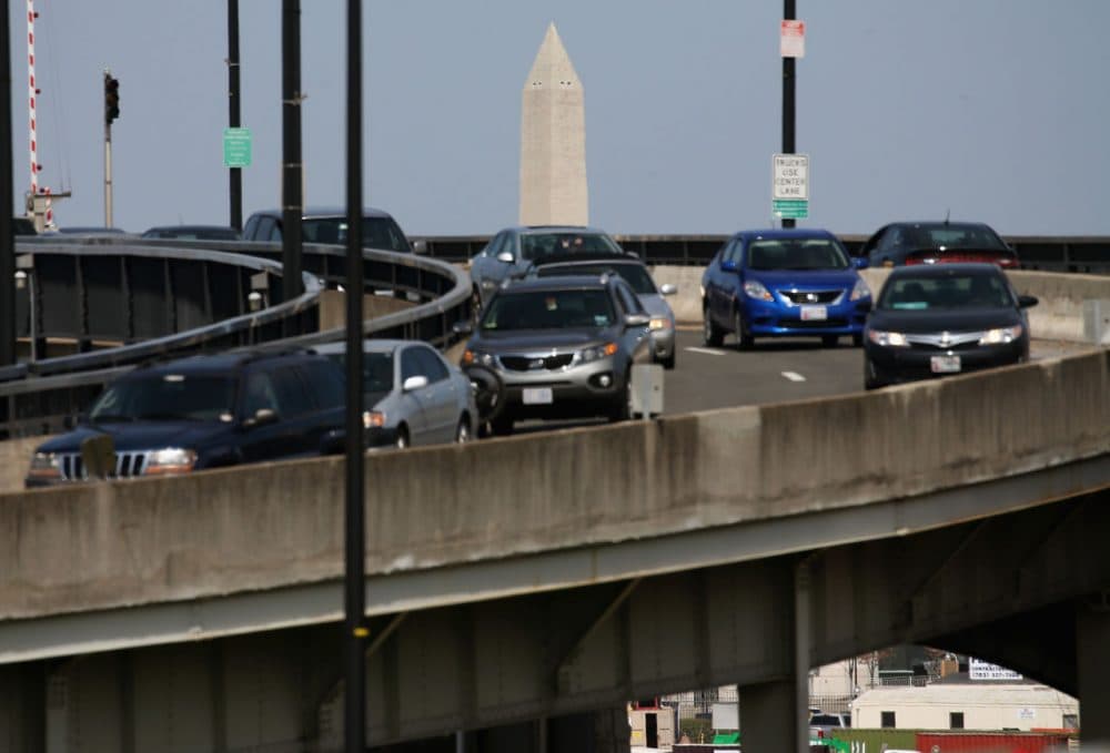 The Washington Monument can be seen as traffic travels over the Frederick Douglass Memorial Bridge, also known as the South Capitol Street bridge April 13, 2015 in Washington, D.C. (Mark Wilson/Getty Images)