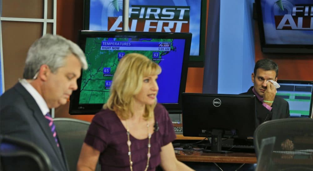 Janna Malamud Smith: The ability to amplify our worst transgressions is new, and, it seems to be a drug more potent and addictive than any other. In this photo, WDBJ meteorologist Leo Hirsbrunner, right, wipes his eyes during the early morning newscast as anchors Kimberly McBroom, center, and Steve Grant deliver the news at the station in Roanoke, Va., Thursday, Aug. 27, 2015. Reporter Alison Parker and cameraman Adam Ward were killed during a live broadcast Wednesday. (Steve Helber/ AP)