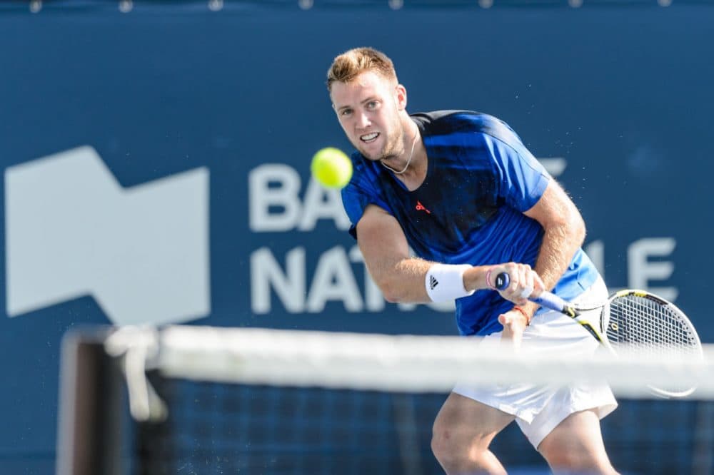 Jack Sock of the USA returns the ball against Rafael Nadal and Fernando Verdasco of Spain during day one of the Rogers Cup at Uniprix Stadium on August 10, 2015 in Montreal, Quebec, Canada. (Minas Panagiotakis/Getty Images)