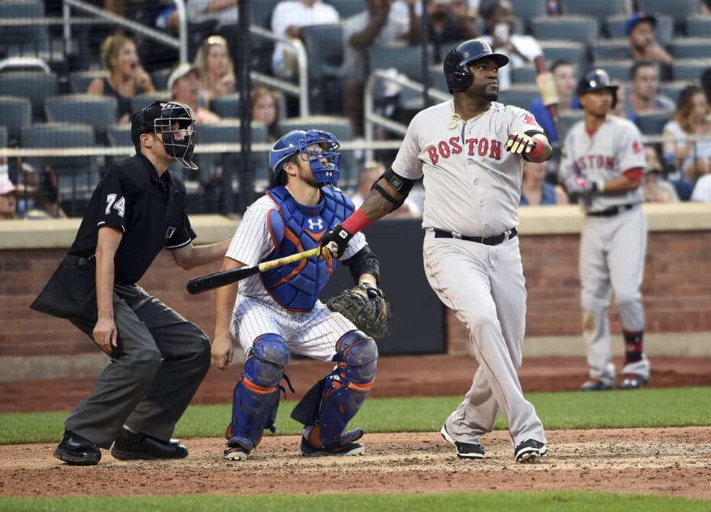 New York Mets catcher Travis d'Arnaud and Boston Red Sox's David Ortiz watch Oritz's double off of New York Mets pitcher Bartolo Colon in the ninth inning of a baseball game at Citi Field on Saturday. (Kathy Kmonicek/AP)