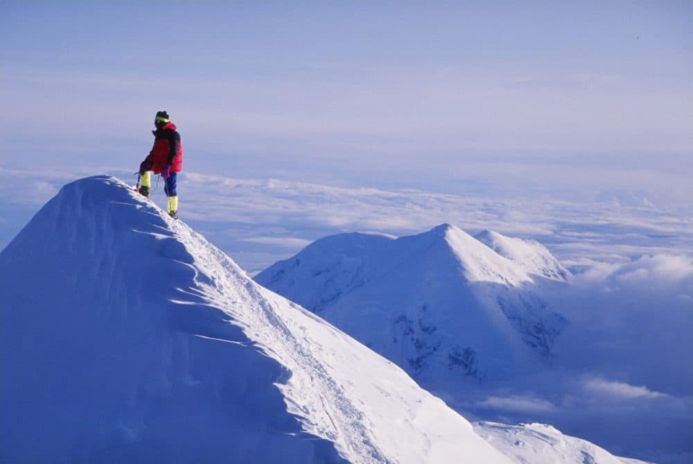 A lone climber stands on the Summit Ridge at Denali, formerly called Mount McKinley. (Mike Powell/Getty Images)