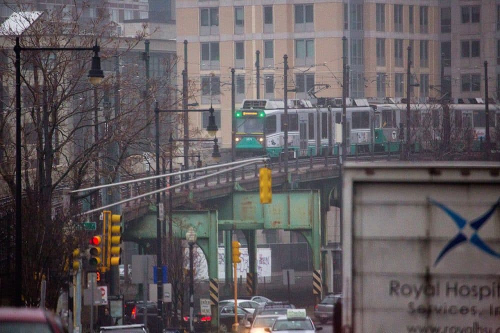 An MBTA Green Line train enters Lechmere Station in Cambridge. The cost set by the Green Line Extension contractor for the first three stations is more than double the amount state and federal transit officials recently estimated, officials revealed Monday. (Jesse Costa/WBUR)