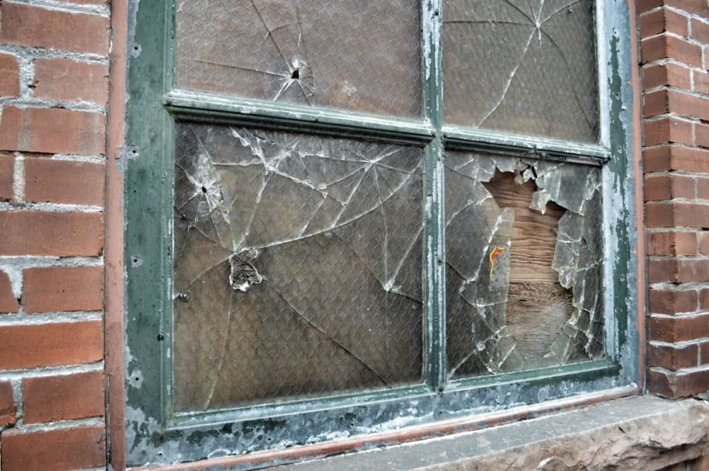 The theory of Broken Windows comes from James Q. Wilson and George Kelling, who wrote an article about the phenomenon in The Atlantic in 1982. (_scartissue/Flickr)