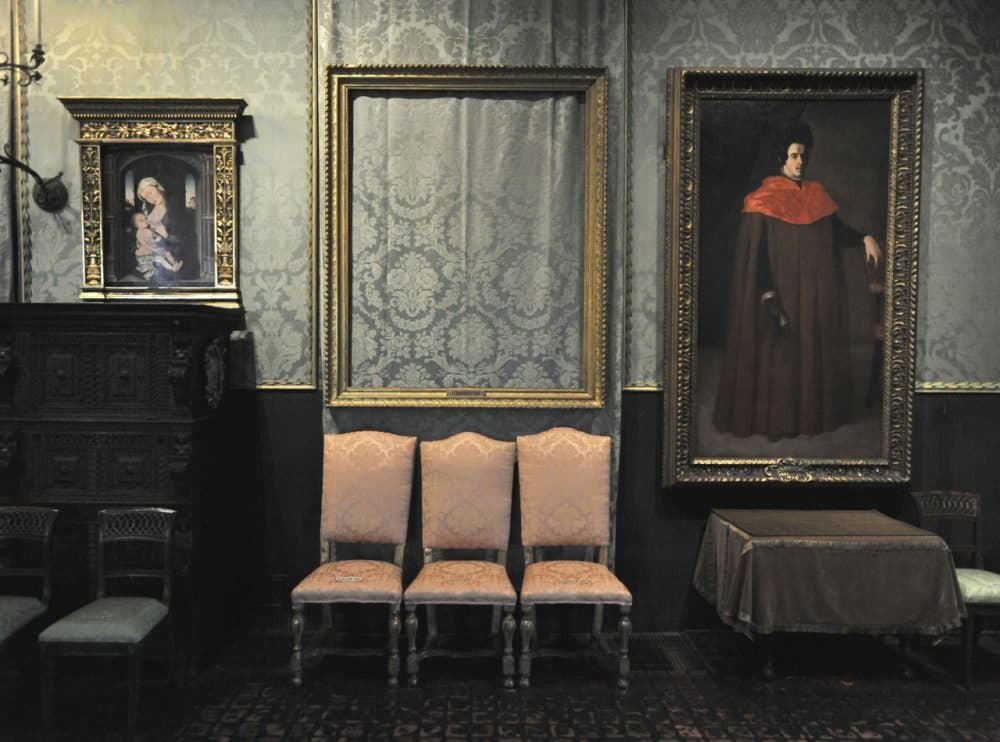 In this 2010 photo, the empty frame from which thieves cut Rembrandt's &quot;Storm on the Sea of Galilee&quot; remains on display at the Isabella Stewart Gardner Museum. The painting was one of 13 works stolen from the museum in 1990. (Josh Reynolds/AP)