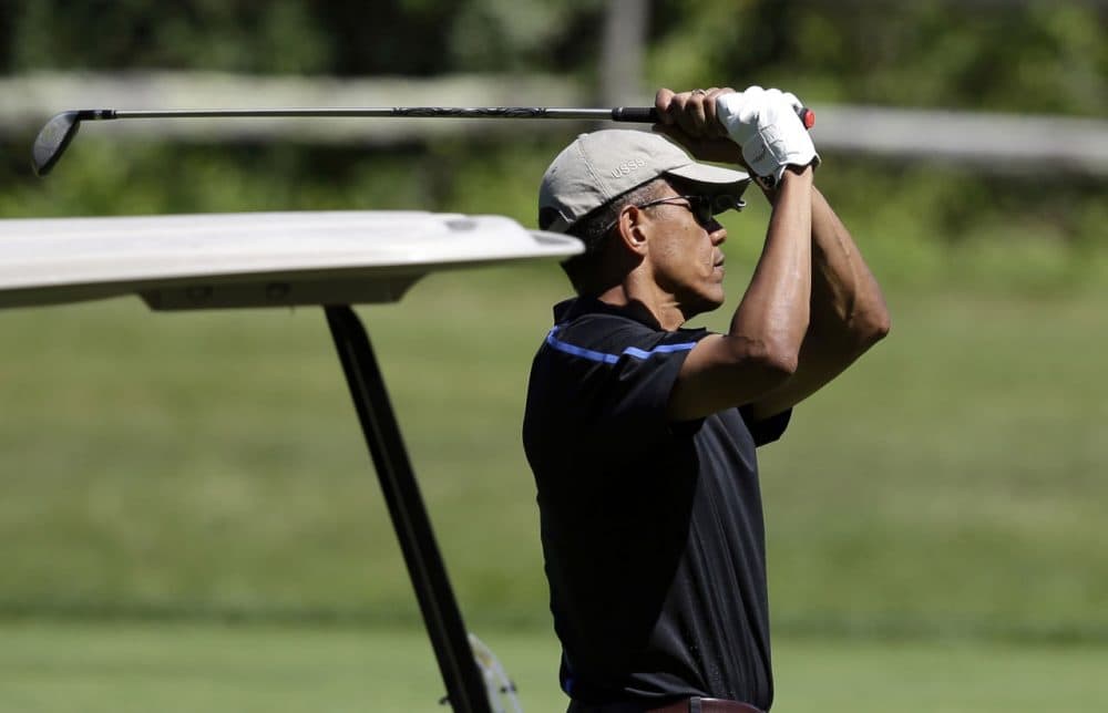 President Obama golfs at Farm Neck Golf Club, in Oak Bluffs, Mass., on Aug. 15, 2014. (Steven Senne/AP)