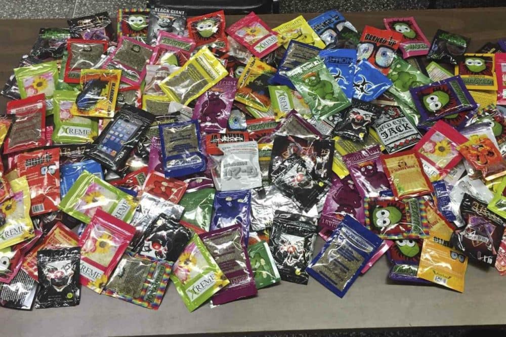 This photo provided Aug. 7 by the New York Police Department shows packets of synthetic marijuana seized after a search warrant was served at a newsstand in Brooklyn. (AP)