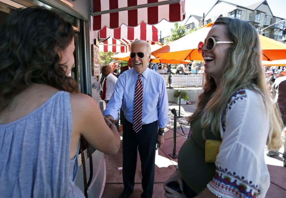 Vice President Joe Biden greets customers during a visit to Little Man Ice Cream in Denver last month. (Brennan Linsley/AP)