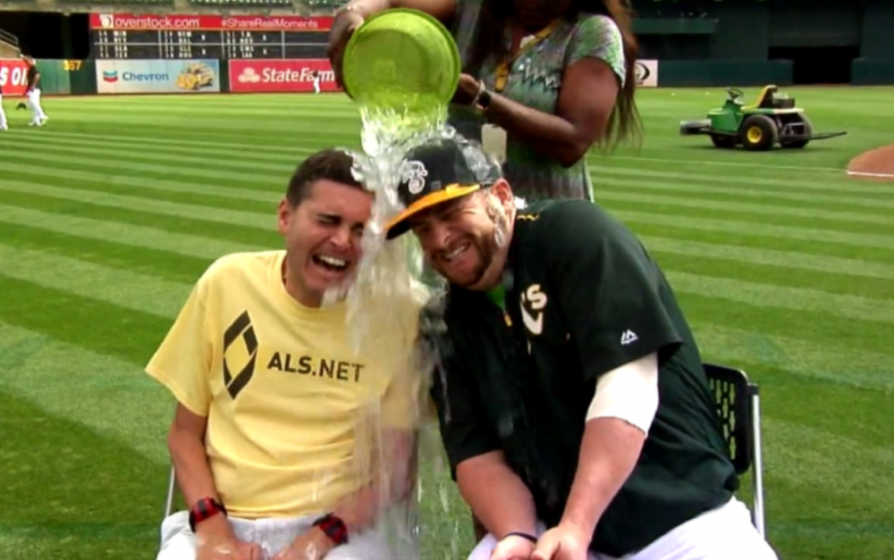In this screen grab from a video posted on the Oakland A's Facebook page, Corey Reich (left) and catcher  Stephen Vogt participate in the ALS Ice Bucket Challenge on August 19, 2015.