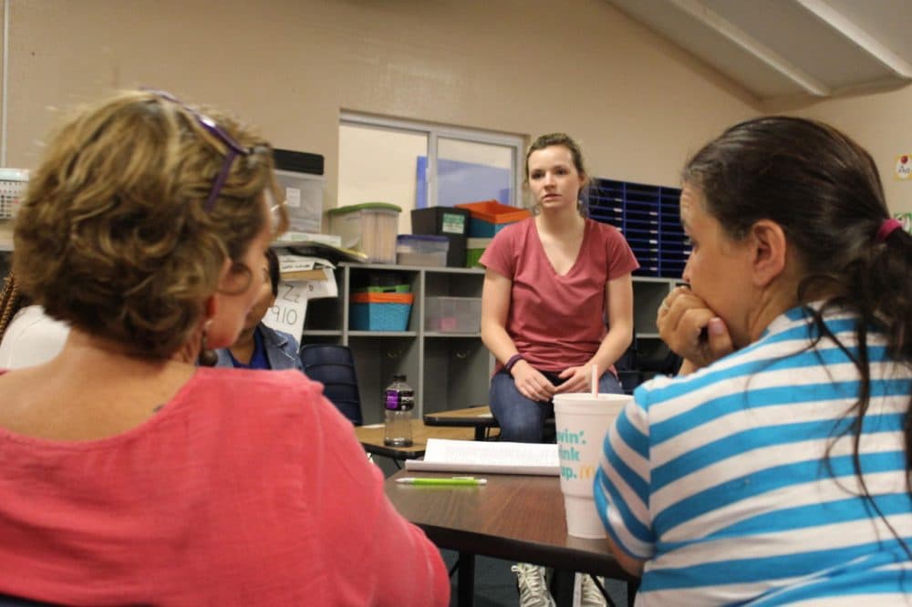 First-year teacher Rachel Foster gets advice from her veteran colleagues, including her mother Lisa. (Kyle Palmer/KCUR)