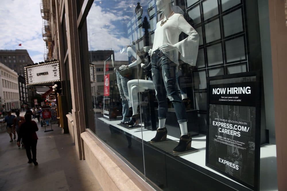  A &quot;now hiring&quot; sign is posted in the window of an Express clothing store on July 2, 2015 in San Francisco, California. According to a report by the U.S. Labor Department, employers added 223,000 jobs in June dropping the national unemployment rate to 5.3 percent, the lowest level since April 2008.  (Justin Sullivan/Getty Images)