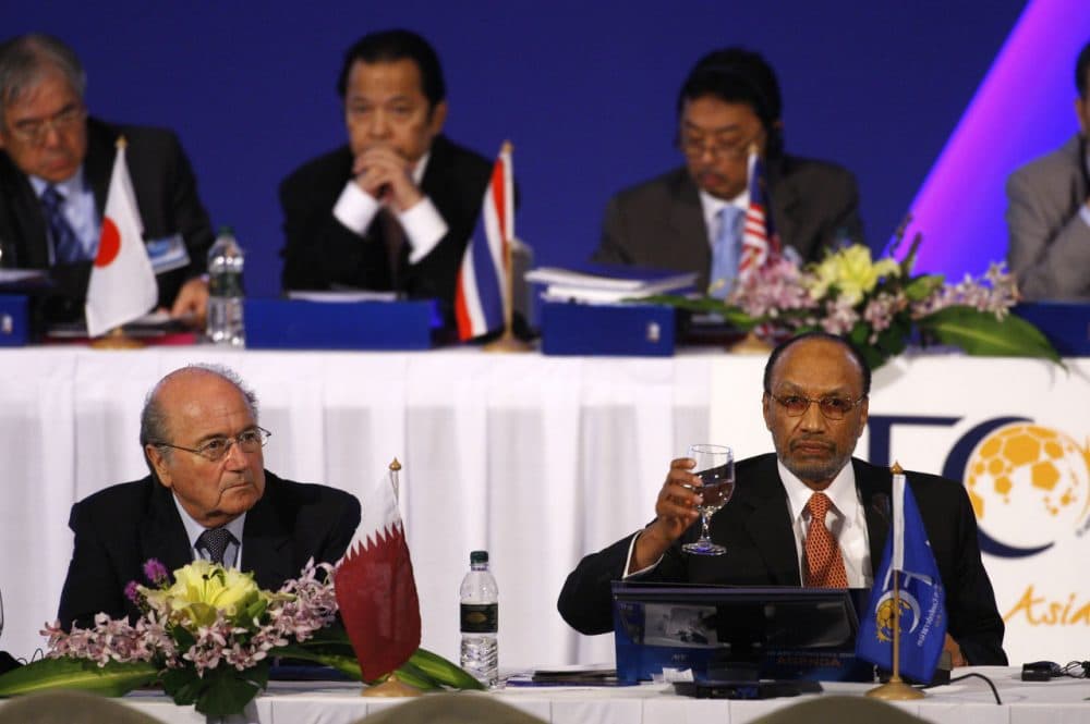 Sepp Blatter (left) with Mohamed bin Hammam (right) (Mark Baker/AP)
