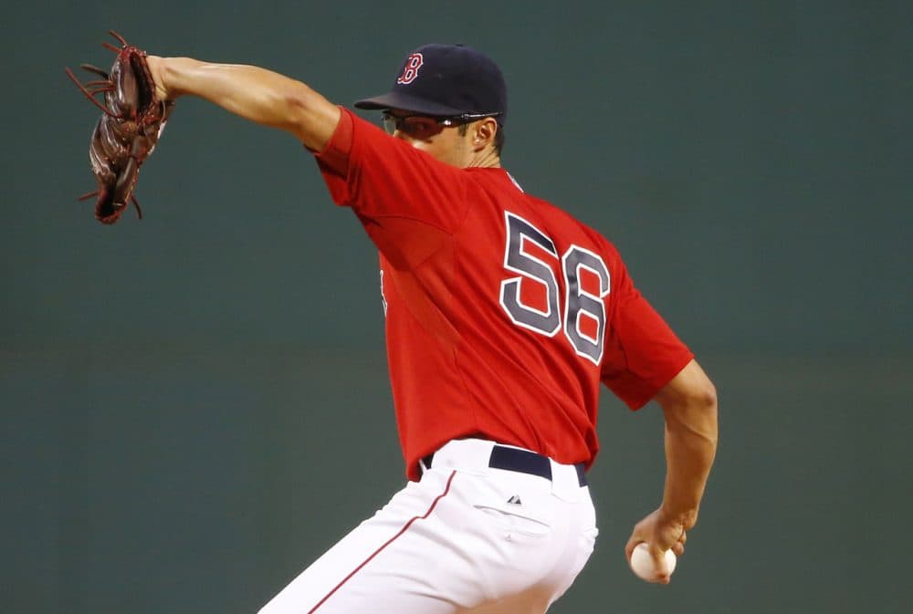 Boston Red Sox starting pitcher Joe Kelly delivers against the Philadelphia Phillies during the first inning of a baseball game at Fenway Park in Boston Friday, Sept. 4, 2015. (Winslow Townson/AP)