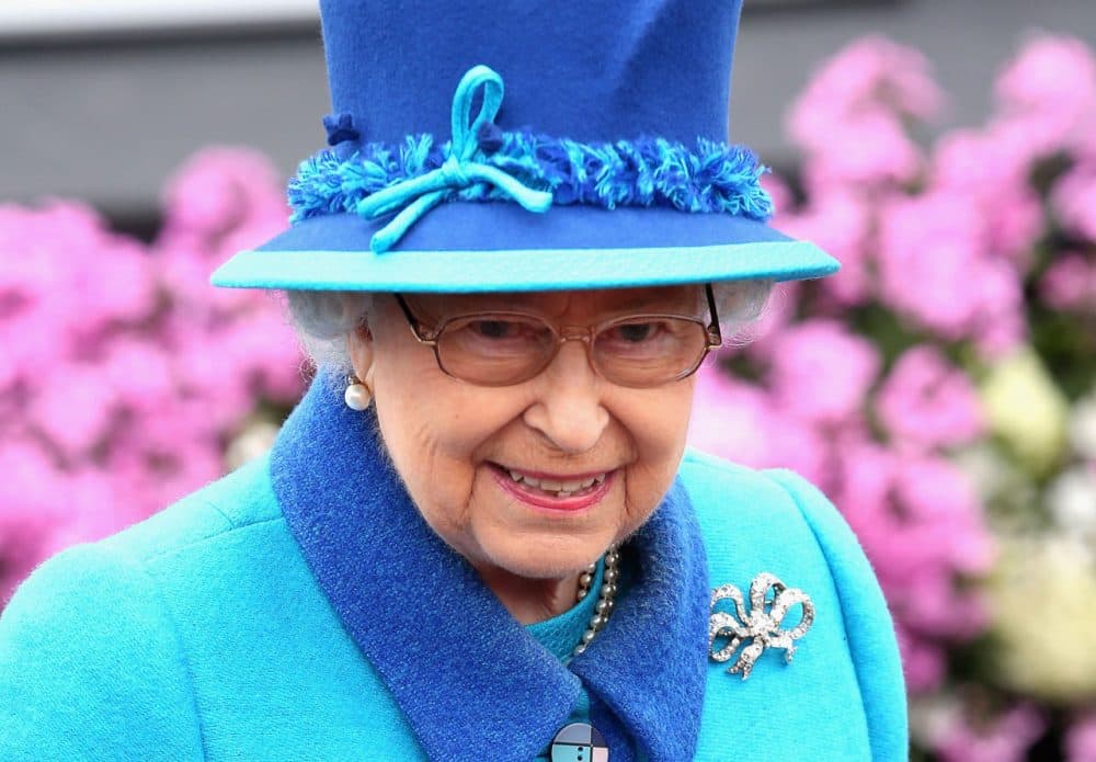 Queen Elizabeth II smiles as she arrives at Tweedbank Station on September 9, 2015 in Tweedbank, Scotland. Today, Her Majesty Queen Elizabeth II becomes the longest reigning monarch in British history, overtaking her great-great grandmother Queen Victoria's record by one day. The Queen has reigned for a total of 63 years and 217 days. Accompanied by her husband, the Duke of Edinburgh and Scotland's First Minister Nicola Sturgeon, she will officially open the new Scottish Border's Railway which runs from the capital to Tweedbank. (Chris Jackson/Getty Images)