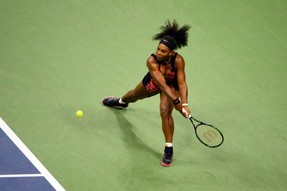 Serena Williams of the United States returns a shot to Venus Williams of the United States during their Women's Singles Quarterfinals match on Day Nine of the 2015 U.S. Open at the USTA Billie Jean King National Tennis Center on September 8, 2015 in the Flushing neighborhood of the Queens borough of New York City. (Alex Goodlett/Getty Images)