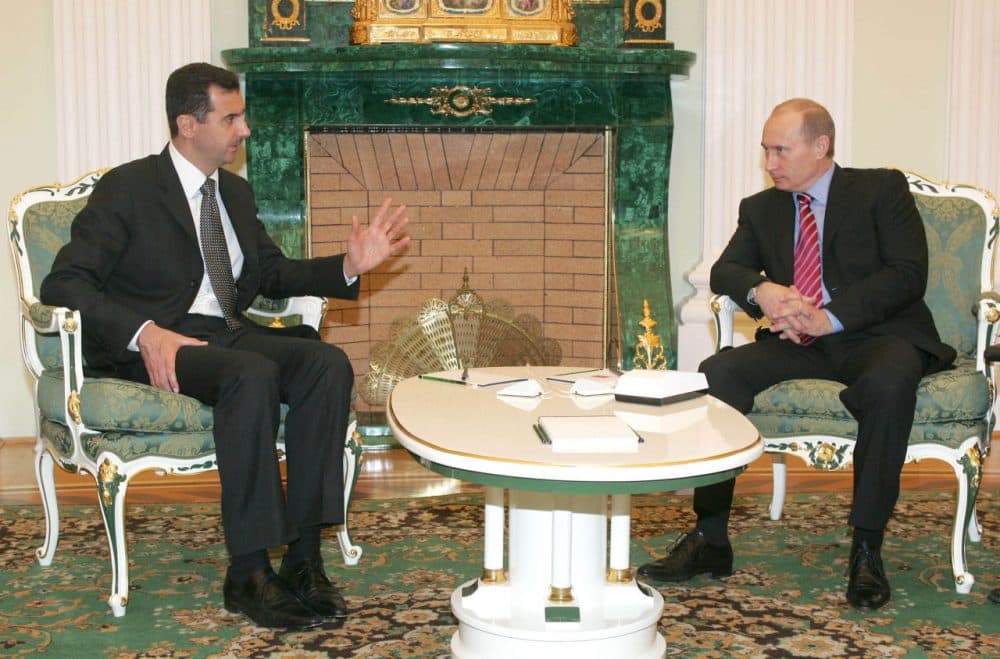 Russian President Vladimir Putin, right, listens to his Syrian counterpart Bashar Assad during a meeting in Moscow's Kremlin, Tuesday, Dec. 19, 2006. Putin hosted his Syrian counterpart for talks focusing on tensions among the Palestinians, Lebanon's political standoff and the stalled Middle East peacemaking - part of Moscow's efforts to bolster its role in the region amid escalating crises. (Sergei Karpukhin/AP)