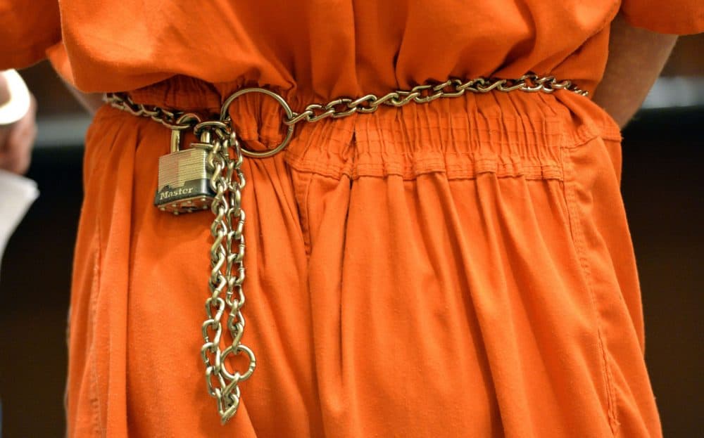 A defendant in waist chains is among a group of prisoners that are being evaluated for their willingness to participate in drug treatment program, also known as SMART probation at the Pulaski County Courthouse in Somerset, Ky., Thursday, April 9, 2015. The probation program provides medication that blocks the opioid receptors in the brain. It means opioids like prescription painkillers and heroin would have no effect on addicts, which would help them stop using the drugs. (Timothy D. Easley/AP)