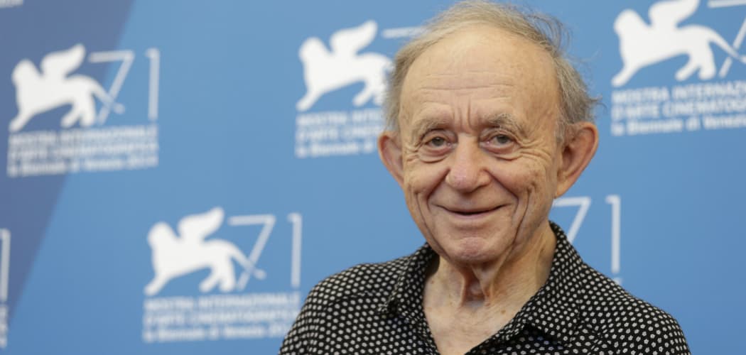 Cambridge-based documentarian Frederick Wiseman is debuting &quot;In Jackson Heights&quot; as well as a ballet based on his renowned &quot;Titicut Follies&quot; at this year's Toronto International Film Festival. He appears in this photo during the 2014 Venice Film Festival. (David Azia/AP)