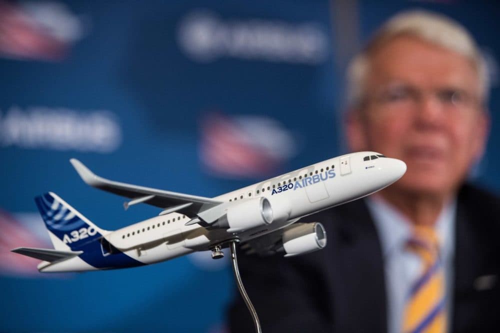 A model of an Airbus A320 jetliner is seen as Allan McArtor, Airbus Group, Inc. Chairman and CEO, speaks at a press conference in Mobile, Alabama, on September 13, 2015. Airbus will inaugurate its first US manufacturing facility on September 14.    (Nicholas Kamm/Getty)