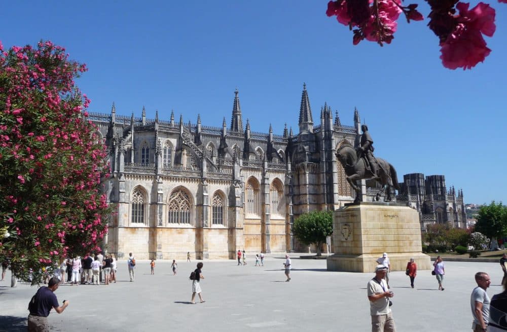 Tourists visit the Monastery of Batalha in Batalha, Portugal. The town's name means &quot;battle.&quot; (suhajdab/Flickr)