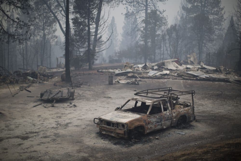 A burned truck and structures are seen at the Butte Fire on September 13, 2015 near San Andreas, California. California governor Jerry Brown has declared a state of emergency in Amador and Calaveras counties where the 100-square-mile wildfire has burned scores of structures so far and is threatening 6,400 in the historic Gold Country of the Sierra Nevada foothills. (David McNew/Getty Images)