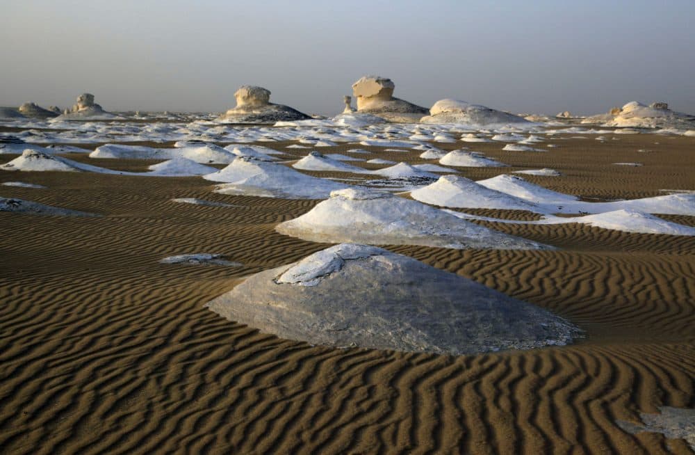 The Egyptian White desert, about 310 miles southwest of Cairo, Egypt, is pictured on May 19, 2013. At least 12 people were killed and 10 injured in Egypt's southwestern desert Sunday, Sept 13, 2015, when security forces mistakenly fired on a group of Mexican tourists, Egyptian officials said. The Mexican Foreign Ministry confirmed the incident and said at least two of the dead were Mexican nationals. (Manoocher Deghati/AP)