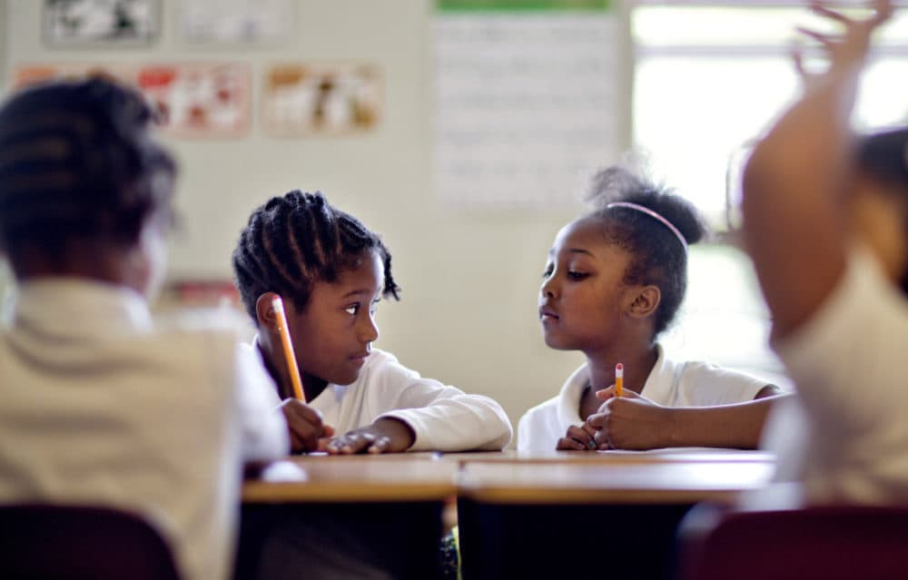 The Boston Public Schools system has one of the most racially and ethinically diverse pools of students in the nation: 87 percent are students of color. For decades, the school system has struggled to recruit minority teachers, however. School officials are increasing efforts to attract teachers from diverse backgrounds. (David Goldman/AP)