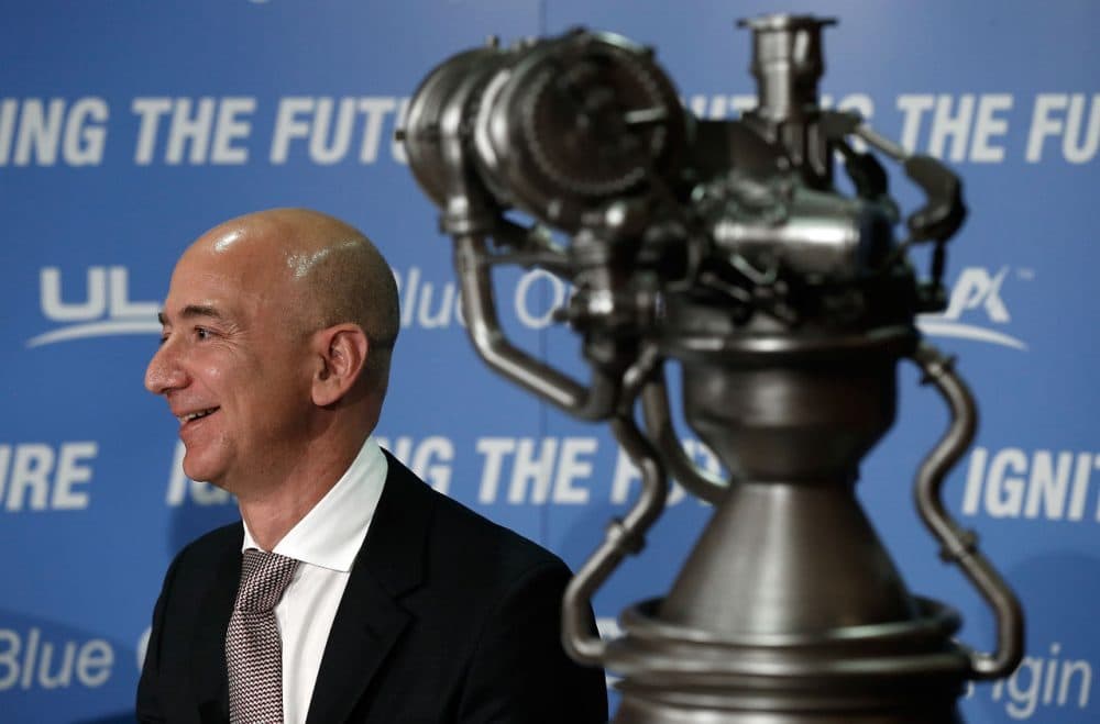 Jeff Bezos, the founder of Blue Origin and Amazon.com, appears at a press conference to announce the new BE-4 rocket engine with Tory Bruno, CEO of United Launch Alliance, at the National Press Club September 17, 2014 in Washington, D.C. (Win McNamee/Getty Images)
