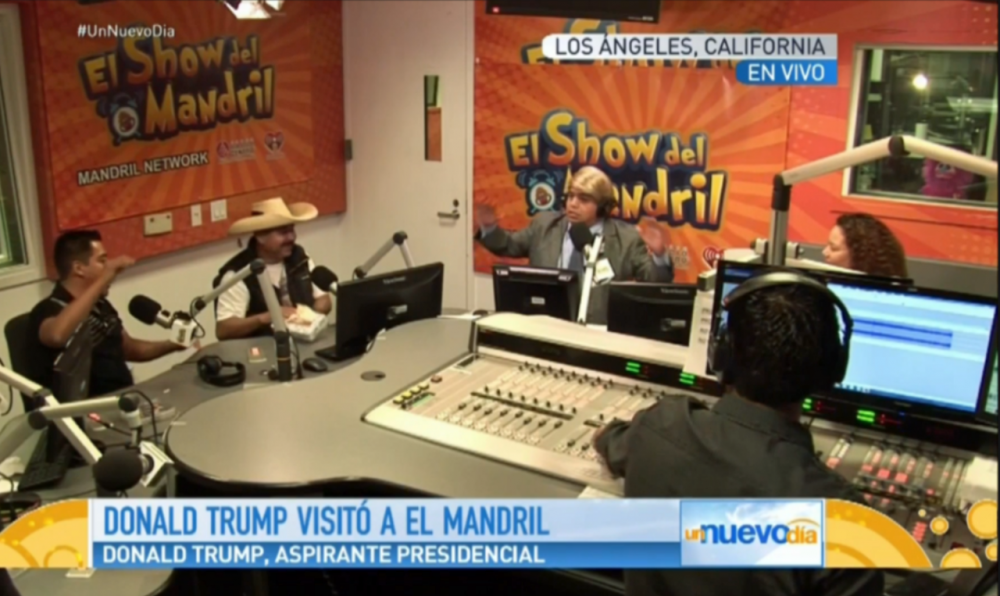 In this screenshot from a broadcast of &quot;Un Nuevo Dia&quot; on Telemundo, a man impersonates Donald Trump for a skit. (telemundo.com)