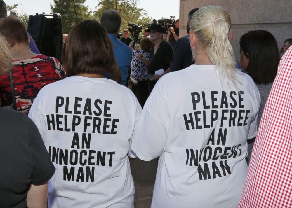 Ericka Glossip-Hodge, left, daughter of Richard Glossip, and Billie Jo Ogden Boyiddle, right, Richard Glossip's sister, listen during a rally to stop the execution of Richard Glossip, in Oklahoma City, Tuesday, Sept. 15, 2015. Glossip is scheduled to be executed Wednesday, Sept. 16. (Sue Ogrocki/AP)