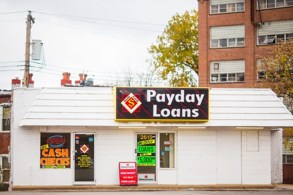 A check cashing and payday loan store is pictured in St. Louis, Missouri. (thomashawk/Flickr)