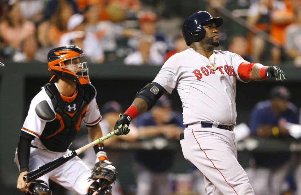 Red Sox's David Ortiz, right, watches his solo home run in front of Orioles catcher Caleb Joseph, Wednesday, Sept. 16, 2015, in Baltimore. (Patrick Semansky/AP)