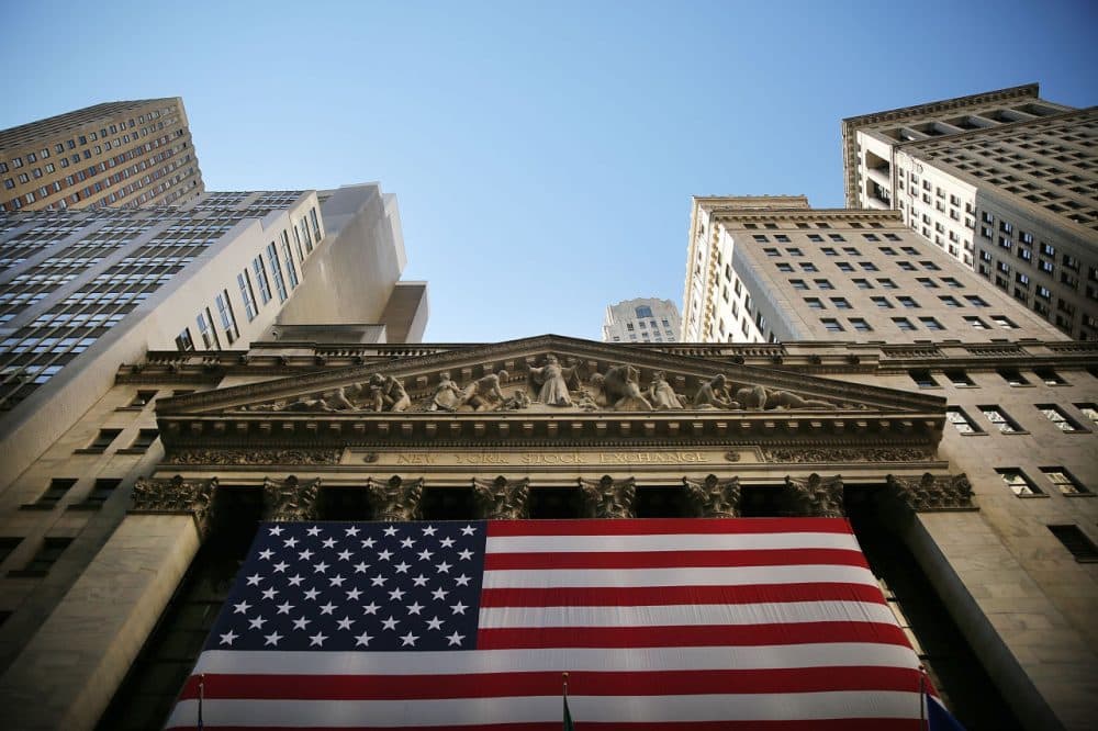 Dow soars over 250 points ahead of federal interest rate announcement. (Spencer Platt/Getty Images)