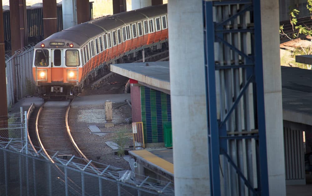 An Orange Line train pulls into Community College Station in Charlestown. (Jesse Costa/WBUR)