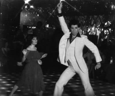 John Travolta and Karen Gorney dance in a nightclub scene to disco music in the 1977 release of &quot;Saturday Night Fever.&quot; (HO/AP)