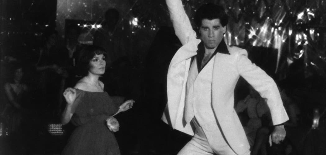 John Travolta and Karen Gorney dance in a nightclub scene to disco music in the 1977 release of &quot;Saturday Night Fever.&quot; (HO/AP)