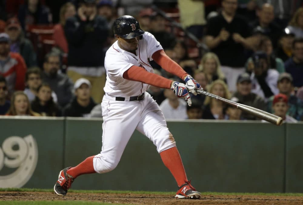 Boston Red Sox shortstop Xander Bogaerts hits a grand slam in the eighth inning of a baseball game against the Tampa Bay Rays. (Steven Senne/AP)