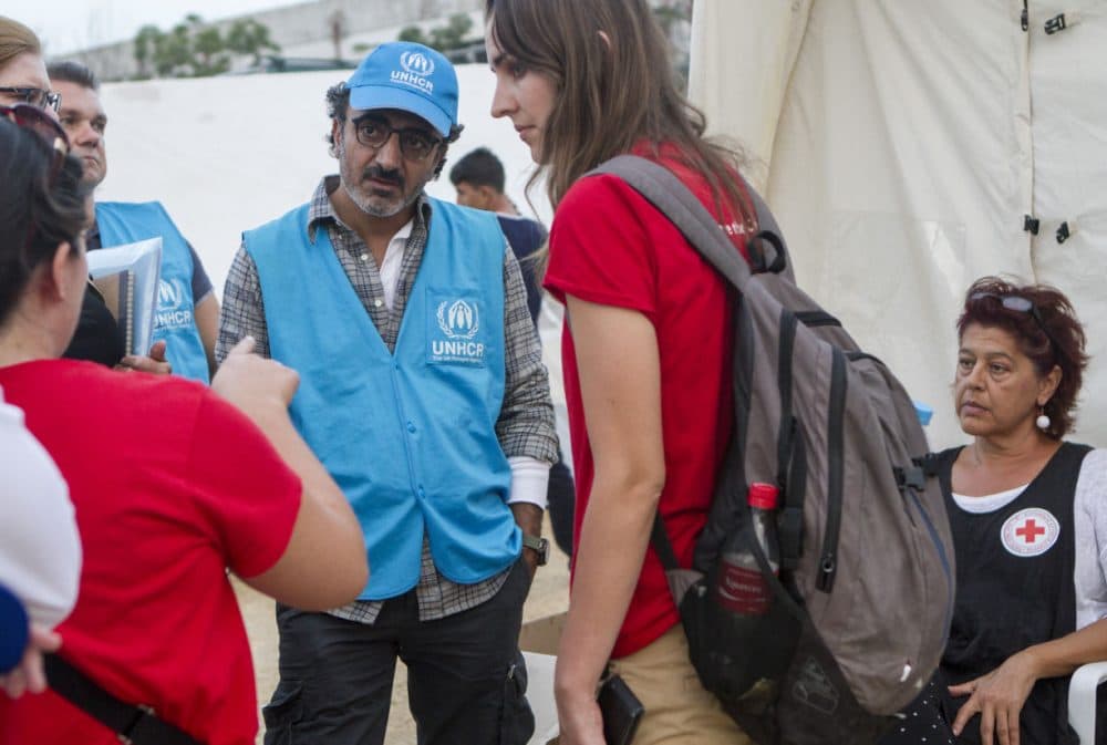 Chobani founder and CEO Hamdi Ulukaya, on the Greek island of Lesbos in September, meeting refugees and humanitarian aid workers there. The Office of the United Nations High Commissioner on Refugees has named Ulukaya an Eminent Advocate on the crisis in Europe. (UNHCR)
 