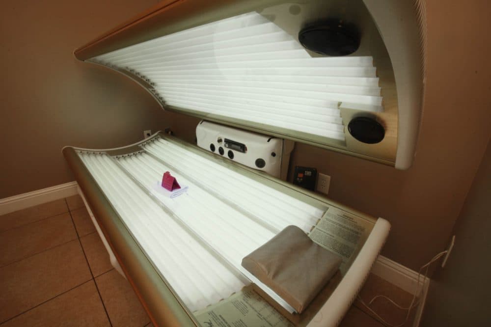 This 2011 photo shows a tanning booth at Amazing Tans in Sacramento. A  bill that would make it illegal for people younger than 18 to use tanning beds has passed the Massachusetts Senate. (Rich Pedroncelli/AP)