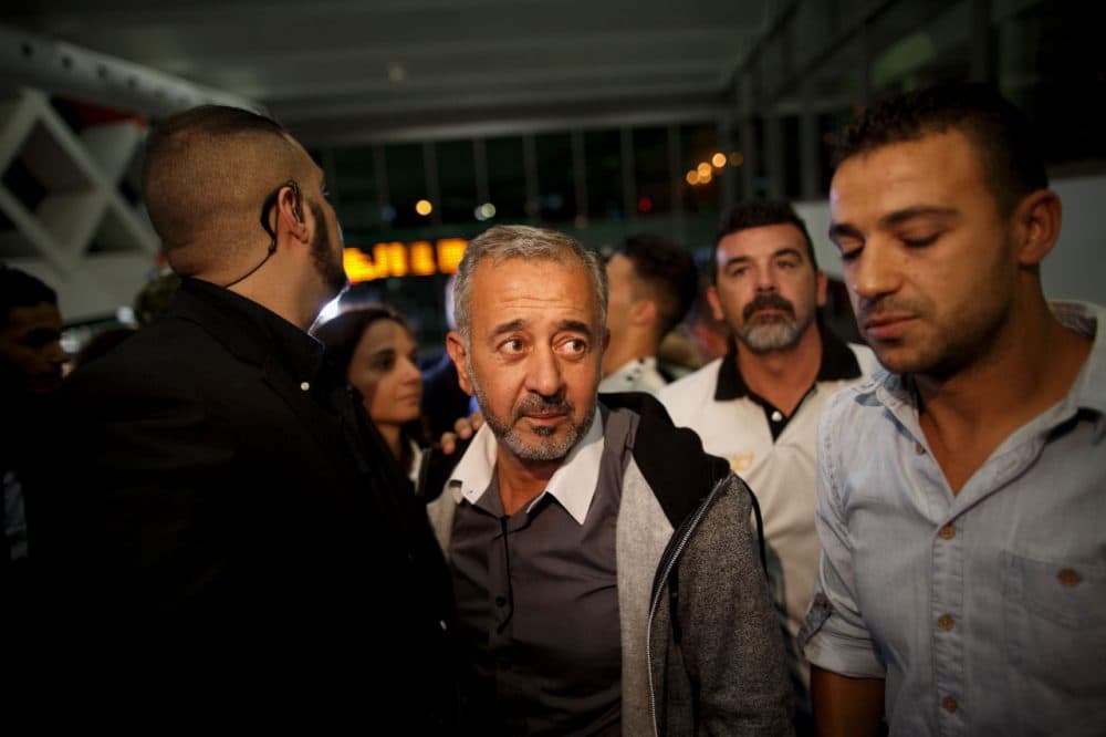 After being tripped on camera while flying a refugee camp, former-Syrian soccer coach Osama Abdul Mohsen could not have expected what his future would hold. (Courtesy Javier Soriano/ Getty Images)