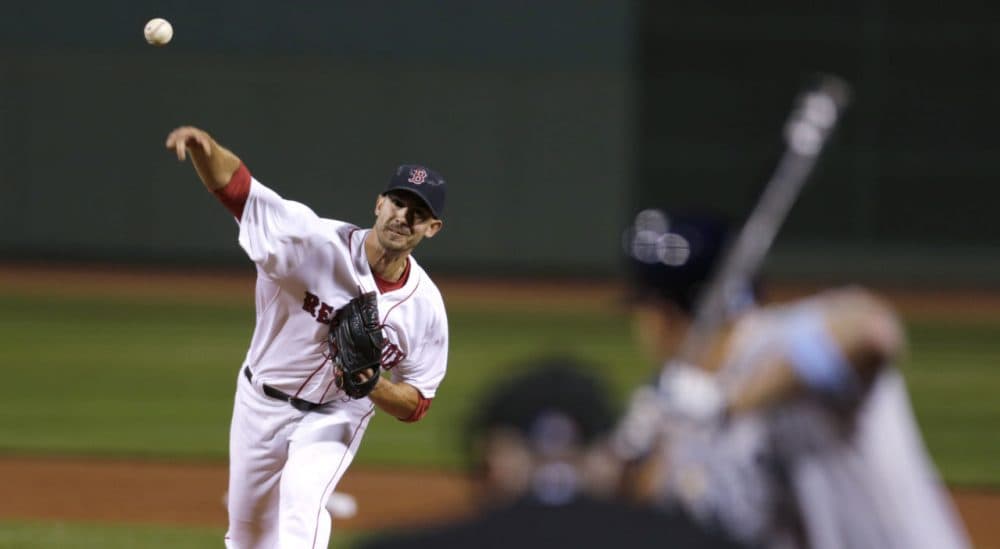 Boston Red Sox starting pitcher Rick Porcello delivers during the first inning of a baseball game at Fenway Park in Boston, on Wednesday. (Charles Krupa/AP)