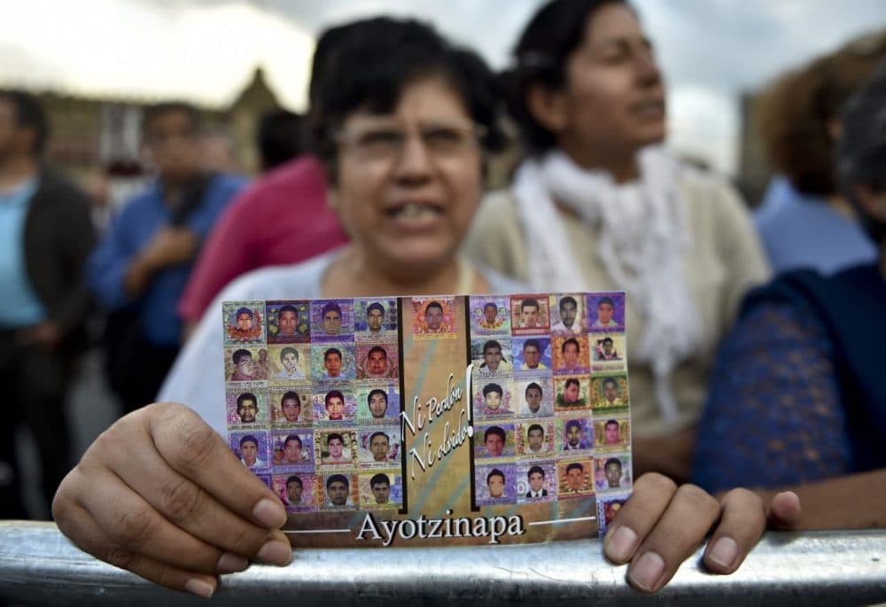 People gathering in Mexico City show their support to parents, relatives and friends of the 43 missing students from a rural teachers college from Ayotzinapa.  (Yuri Cortez/AFP/Getty Images)