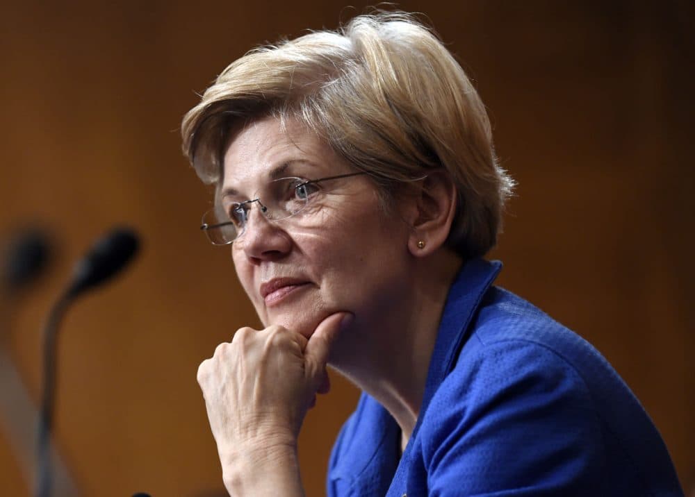 In this July 16 file photo, Sen. Elizabeth Warren listens to Federal Reserve Chair Janet Yellen testify before the Senate Banking, Housing, Urban Affairs Committee in Washington, D.C. (Susan Walsh/AP)