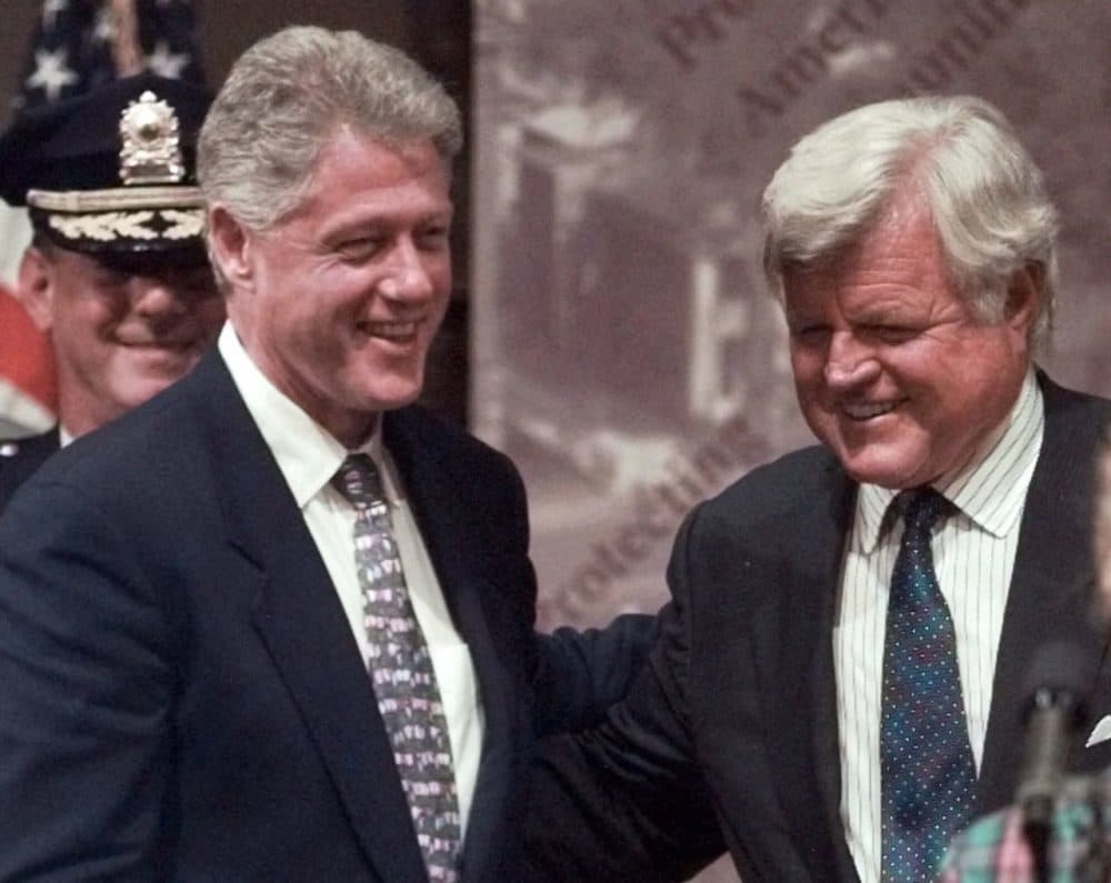 President Clinton smiles with U.S. Sen. Edward Kennedy, D-Mass., at Mechanics Hall in Worcester in 1998, prior to Clinton's speech on school safety and juvenile crime. (Elise Amendola/AP)