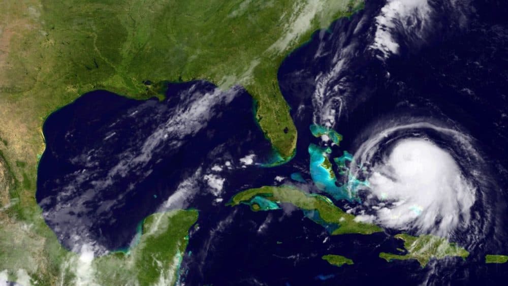 In this handout from the National Oceanic and Atmospheric Administration (NOAA), Hurricane Joaquin is seen churning in the Caribbean on September 30, 2015. Joaquin was upgraded to a Category 1 hurricane early on September 30. The exact track has yet to be determined, but there is a possibity of landfall in the U.S. anywhere from North Carolina to the Northeast. (NOAA via Getty Images)
