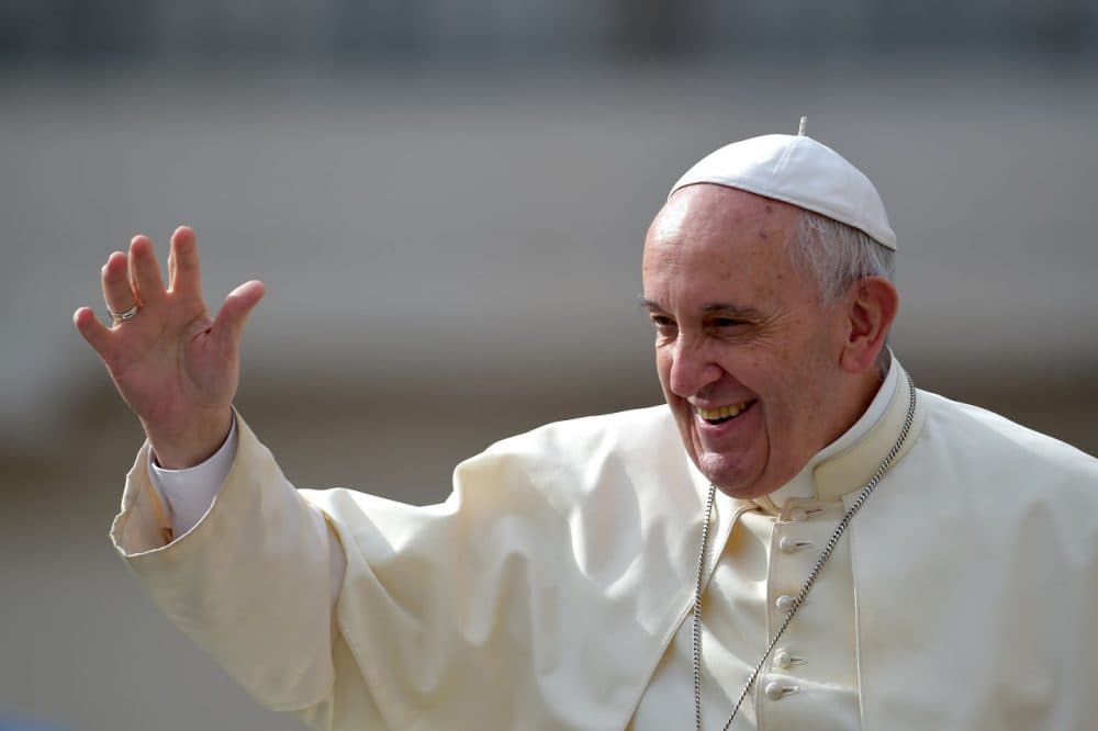 Pope Francis waves as he  arrives in St. Peter's Square for his weekly audience at the Vatican on September 2, 2015.  (Vincenzo Pinto/AFP/Getty Images)